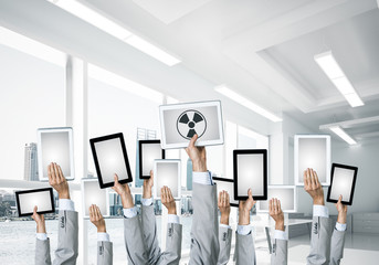 Close of businessman hands in line showing tablet pc with blank 