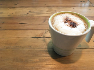 Coffee  on  wooden table background.