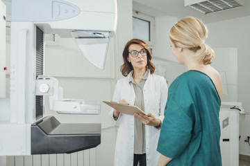 Doctor and Patient on Mammography Examination