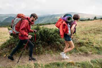 a group of people go to a hike in the mountains