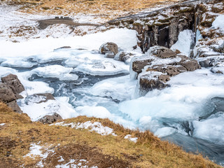 Kirkjufellfoss waterfall in winter, Iceland