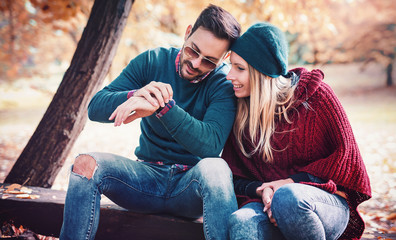 Meeting in the park. Romantic couple in the autumn park. Love, dating, romance