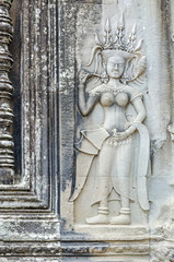 Bas-relief with the devata adorning the walls of the main complex of Angkor Wat