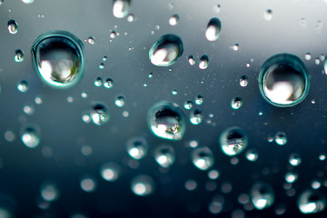 Macro raindrops water on glass