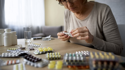 Old lady obsessed with healthcare drinking pill, overdose, self-medication