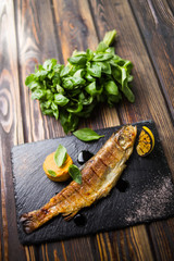 fried fish with basil