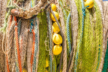 Many fishing nets laid outdoor, drying in the sun. Traditional craft of spain Mallorca, Spain,...