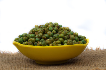 green spicy peas isolated on white background. 