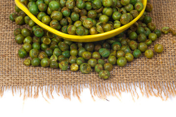 green spicy peas isolated on white background. 
