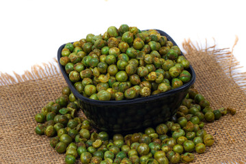 green spicy peas isolated on white background. 