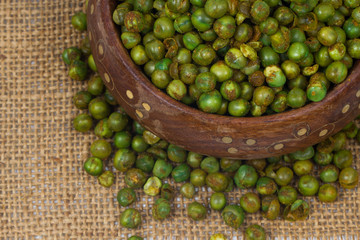 green spicy peas isolated on white background. 