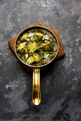 Palak Paneer Curry made up of spinach and cottage cheese served in a bowl or pan with roti or rice