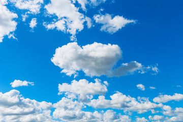 Fototapeta na wymiar Blue sky background with cumulus clouds