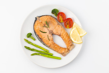Salmon Grilled on a white plate isolated on white background.