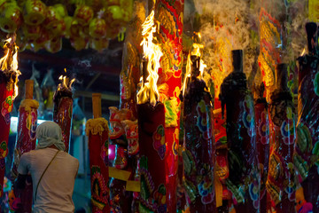 Big incense are burning at vegetarian festival in Thailand.