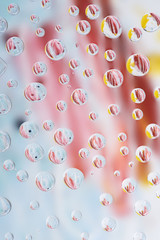 beautiful transparent water drops on blurred abstract background