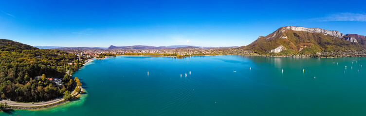 Naklejka na ściany i meble Aerial view of Annecy lake waterfront in France
