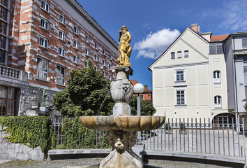 Neptune's fountain with the National and University Library in background, Ljubljana, Slovenia © tynrud