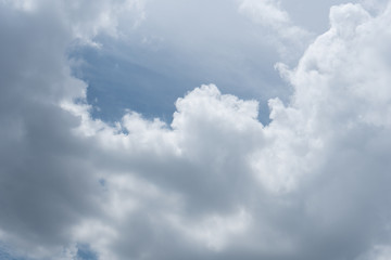 The sky is bright day, the clouds look beautiful.