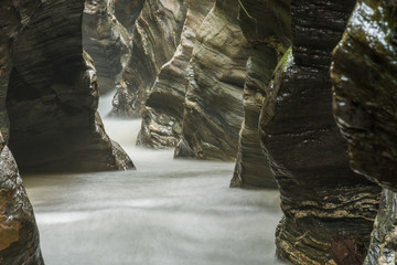 Nature canyons with waterfall surrounded by rocks