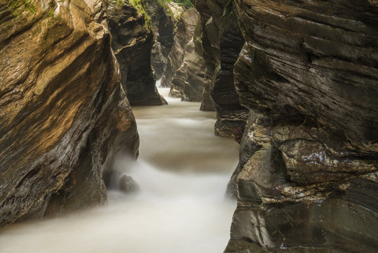 Nature canyons with waterfall surrounded by rocks