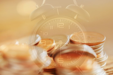 Double exposure Rows of coins of Clock,cash,money, dollar on the table,finance and business concept,Tex time soft focus and blurred style,dark tone.