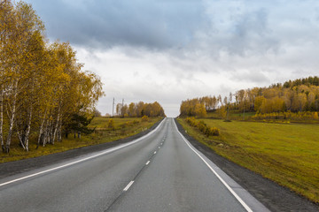 Fototapeta premium autumn view of the highway from the cab