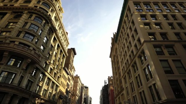 Moving drone shot of iconic historic skyscrapers in soho NYC New York City Manhattan 
