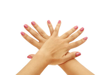 female hands with a beautiful manicure on a white background, isolated