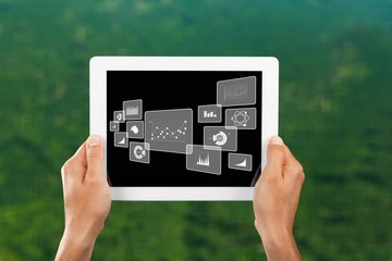 Male hands holding a tablet PC with