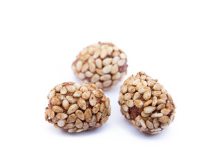 Coated peanuts with sesame isolated on white background