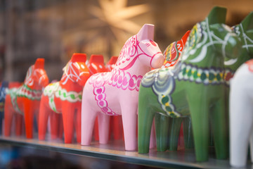 Dala on sales in a tourist shop in Stockholm, Sweeden. Dala is a traditional carved and painted...