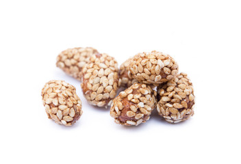 Coated peanuts with sesame isolated on white background
