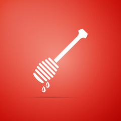 Honey dipper stick with dripping honey icon isolated on red background. Honey ladle. Flat design. Vector Illustration