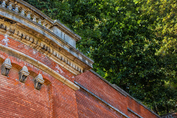 Fragment of a brick wall of an old building