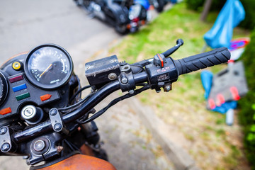 Classic handlebar on an old motorbike at street