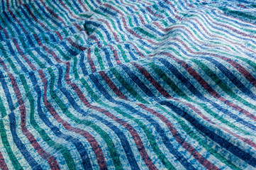 Blue washed faded jeans striped texture with seams