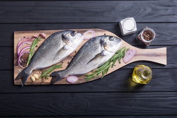 Raw dorado fish and ingridient for cooking