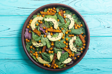 Baby spinach salad with sweet potato , chickpeas and avocado
