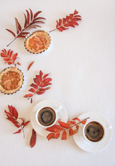 Mini apple cakes with cup of coffee. Enjoy autumn, colors. Keep memories of this autumn. Decorate leafs