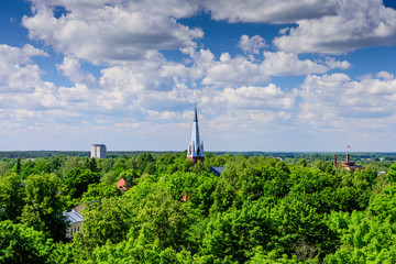 Fototapeta premium Cityscape of Tartu, a beautiful summer view from the observation platform of the Cathedral of Tartu, Estonia
