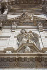 Sculpture on the facade of the temple Cathedral on the Plaza de Catedral in Girona, Spain.