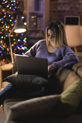 Woman watching movies on Christmas Eve