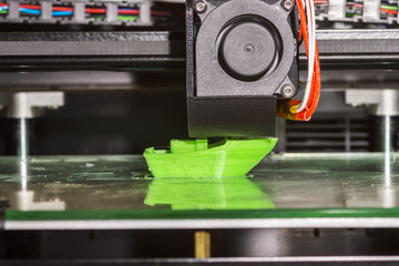 Electronic three dimensional plastic printer during work , 3D printer.