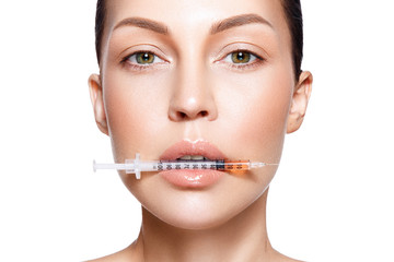 Beautiful woman with injection in her lips. 
