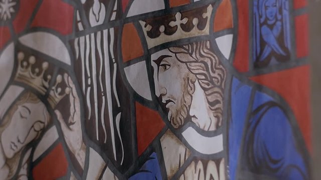 Close-up drawing of medieval stained glass king and