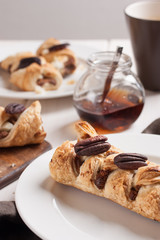 Danish pastry maple pecan with nuts and maple syrup