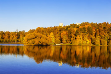 Upper Tsaritsyn pond with island (Bird island) in autumn at sunset, Moscow, Russia.