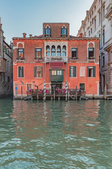Venetian red house by Grand Canal in Venice, Italy