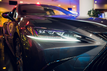 headlight of modern prestigious car close up.